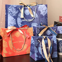 Sacs cadeaux en papier avec logo personnalisé et poignée en ruban pour l'emballage de vente au détail, sacs de luxe pour boutiques, vente en gros