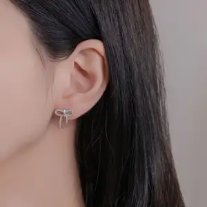 Hypoallergenic S925 Sterling Silver Fashion Gold Plated Small Full Of Zircon Bow Ear Studs For Women