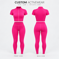 Ensemble de sport deux pièces pour femme : Crop top court à manches courtes entièrement zippé et legging de yoga taille haute avec détails de coutures