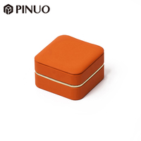 Boîte à bijoux en cuir PU orange PINUO avec insert coussin, doublure en daim crème, bordure dorée, étui cadeau pour bracelet, logo personnalisé