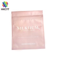 Pochette à fermeture éclair en mylar métallisé rose avec estampage à chaud doré personnalisé pour l'emballage cosmétique