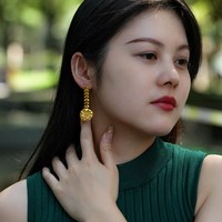 Boucles d'oreilles chandelier à la mode en acier inoxydable avec pendentif solaire de forme ronde plaqué or 18 carats