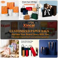 Sacs cadeaux en papier d'art écologiques de luxe en matériaux recyclés, logo personnalisé, estampage à chaud doré, poignées en ruban réutilisables pour cosmétiques