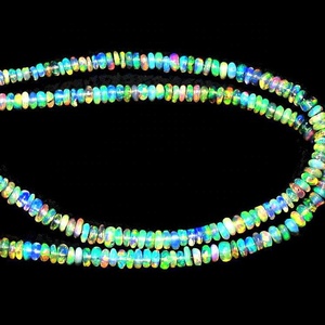 Etíope Welo Opal Plain Rondelle Shape Piedras preciosas sueltas Multi-fire Beads Fabricación de joyas Precio al por mayor por hebra Natural - Product Image 1