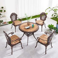 Ensemble table et chaises de jardin en métal Mobilier d'extérieur Patio Table ronde en fonte d'aluminium Chaises