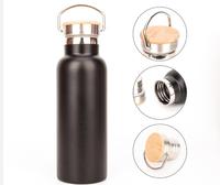 Bouteille d'eau isolée personnalisée en acier inoxydable de vente chaude cantine de sport personnalisée avec couvercle en bambou en vrac