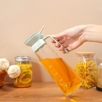Bouteille de verseur d'huile d'olive en verre à haute teneur en borosilicate de 600ml distributeur de vinaigre de forme ronde avec récipient de contrôle de graduation