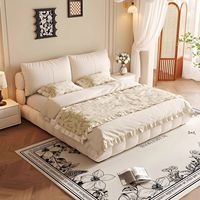 Lit de style moderne crème, rembourré et moelleux, avec rangement et sommier relevable hydraulique, double ou king size, pour chambre principale