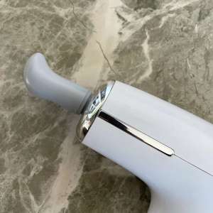 सफेद मालिश बंदूक कंपन मांसपेशी मालिश बंदूक थोक बिजली आवेग मालिश बंदूक - Product Image 2