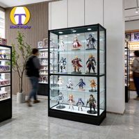 Vitrine d'exposition moderne personnalisée avec éclairage LED, robuste, verre trempé verrouillable pour figurines d'action, idéale pour les magasins de détail et les centres commerciaux