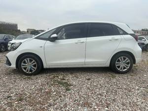 2021 <span class=keywords><strong>Honda</strong></span> Fit 1.5L CVT Hatchback 4 puertas 5 <span class=keywords><strong>plazas</strong></span> FWD gasolina asientos de tela Interior oscuro izquierdo R15 vehículos usados de <span class=keywords><strong>segunda</strong></span> <span class=keywords><strong>mano</strong></span> - Product Image 3