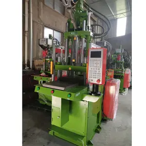 Toy eye manufacturing machine/vertical injection molding machine