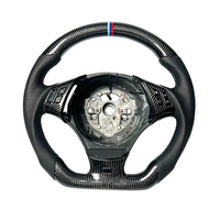 Volant sport en cuir véritable haut de gamme, ergonomique, léger, à fond plat, personnalisé en fibre de carbone pour améliorer l'intérieur du véhicule