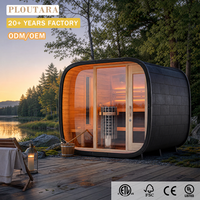Sauna da Esterno PLOUTARA a Cubo Arrotondato con Tetto in Tegole Nere e Vetrata Frontale, Riscaldatore a Roccia OEM per Progetti di Ville, Resort e Spa