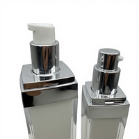 Flacon en plastique noir et blanc de haute qualité de 50 ml et 100 ml avec pompe, emballage pour shampooing, lotion, crème solaire.