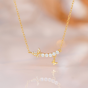 จี้ห้อยคอแฟชั่น CANNER Gold S925 เงินแท้สำหรับผู้หญิง ดีไซน์เรียบหรู ประดับเพชรซิคอน รูปทรงกากบาทคู่ ผีเสื้อ ดาว และพระจันทร์ พร้อมพู่ห้อย - Product Image 2