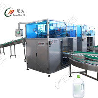 Machine d'emballage automatique de bouteilles en verre, pour lait, carton, ml