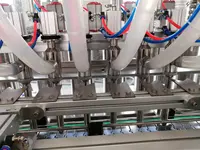 पूरी तरह से स्वचालित शावर जेल कांच की बोतल भराव उत्पादन लाइन शहद डिटर्जेंट तरल भरने की मशीन