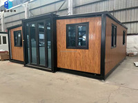 Rumah Kontainer Modern Ekspansiabel 20ft Mewah dengan Pintu Kaca Eksterior Motif Kayu untuk Rumah Kantor Hotel Vila Hunian di Halaman Belakang