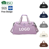 Sac de sport en nylon personnalisé avec bandoulière amovible, poche latérale en filet et poignées rembourrées pour le fitness et les voyages de week-end