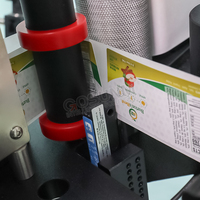 Machine d'étiquetage automatique à grande vitesse pour bouteilles rondes en plastique et verre, flacons et boîtes de conserve