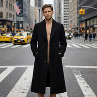 Manteau long sur mesure pour homme en mélange de laine noir, à simple boutonnage et revers crantés, idéal pour les occasions formelles ou décontractées, vêtement d'hiver.