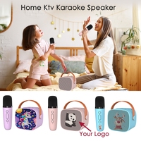 Mini LED Machine Karaoké Sans Fil Haut-Parleur Actif Lecteur Double Microphone Portable Instruments de Musique Jouet