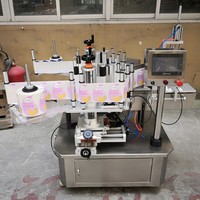 Étiqueteuse de bouteilles semi-automatique pour dispositif d'étiquetage de pot de pot en plastique collant la cruche de boîtes cosmétiques