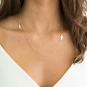 สร้อยคอแฟชั่นใหม่สำหรับผู้หญิงดีไซน์ยุโรปและอเมริกาจี้รูปนกแบบทันสมัย - Product Image 1