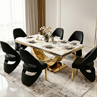 Ensemble de table à manger moderne de luxe avec plateau en marbre et base en acier inoxydable doré, chaises de salle à manger en velours pour la maison, l'hôtel ou la villa