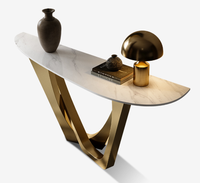 Console d'entrée de luxe avec plateau en pierre frittée et structure en acier inoxydable, table de canapé