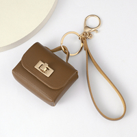 Mini sac à dos porte-clés pour femmes, jolie pochette à monnaie en cuir PU avec porte-clés, sac de maquillage multi-poches, porte-cartes, organiseur de câbles
