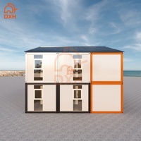 Maison préfabriquée moderne à deux étages DXH Custom, en conteneurs, avec panneaux sandwich en acier, pour chambre, villa, appartement, hôtel, dortoir, usage domestique