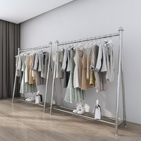 Expositor de ropa de acero inoxidable para tiendas, con barra de suelo y gancho para colgar, ideal para exhibición de ropa de niña.
