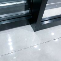 Système Aomeja OPK Perfect : Porte coulissante à cadre ultra-fin, fermeture douce, isolation acoustique, rail dissimulé en aluminium minimaliste pour villa