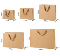 Sacs cadeaux en papier kraft personnalisés avec ruban et logo personnalisé pour vêtements