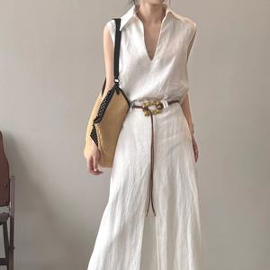 Ensemble en lin tendance 2025 pour femme : haut rayé et jupe midi à volants (2 pièces) - Product Image 1