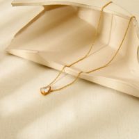 Collier pendentif ovale goutte d'eau plaqué or 18 carats avec zircon solitaire, collier ras du cou en acier inoxydable avec cristal CZ pour femme