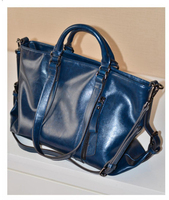 Sac à main vintage en cuir PU pour femme, grande capacité, sac fourre-tout imperméable, sac bandoulière avec pompon, style de créateur de luxe