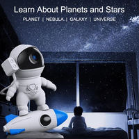 Projecteur de Galaxie Astronaute Rocket Lampe de Nuit et 12 Films Projecteur Céleste Rotation à 360° Planétarium pour Chambre d'Enfant