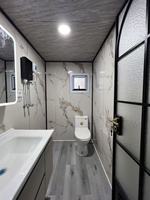 Casa Contenedor Modular Plegable Transpirable JUJIU Moderna de 20 Pies con Certificación CE para Uso en Tiendas, Hoteles, Oficinas y Villas