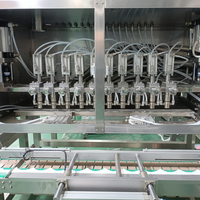Ligne de remplissage à chaud entièrement automatique électrique avec pompe à engrenages et roulement de moteur pour baume à lèvres, pommade, avec système de refroidissement par congélation et capsuleuse à scellage sous film