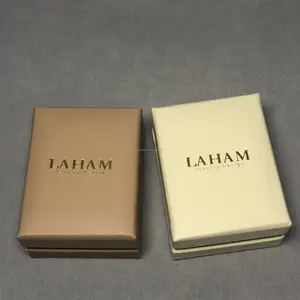 Fournisseur chinois Boîte d'emballage de bijoux Cadeau de luxe supérieur en cuir PU Logo OEM personnalisé étui à pendentif portable laham