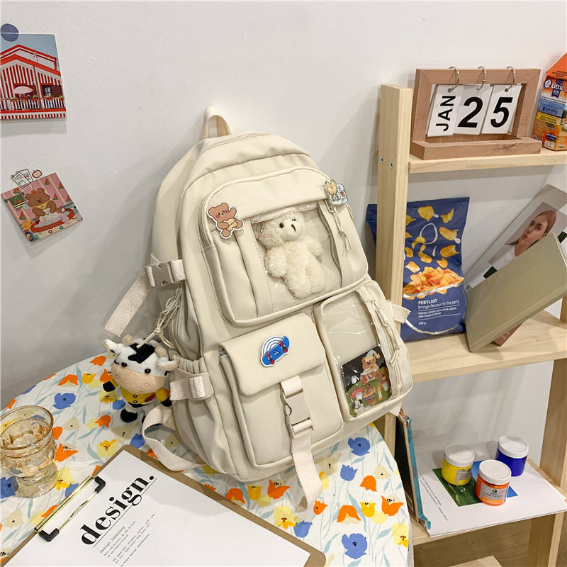 พวงกุญแจหมีสีขาวพร้อมอุปกรณ์เสริมแบบสุ่ม 3 ชิ้น และการ์ด 1 ใบ