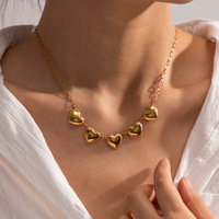 Collier unisexe en acier inoxydable, bijoux tendance, chaîne à maillons plaquée or 18 carats avec breloques en forme de cœur chromé
