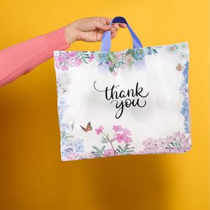 Bolsa de Regalo 15x12 de Plástico con Asa Suave y Diseño Floral - Product Image 5