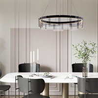 Luminaire suspendu LED rond de style minimaliste moderne avec panneau en verre gris fumé multicouche pour restaurants et magasins de vêtements.