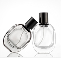 Botella de perfume de repuesto de vidrio transparente esmerilado 30ml reciclable de lujo con tapa de pulverización de bomba negra