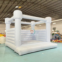 Château gonflable commercial en PVC bleu ciel avec toboggan pour enfants, idéal pour les fêtes de mariage en extérieur