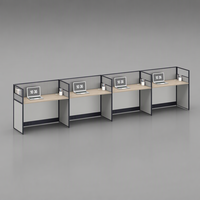 Bureau de travail modulaire moderne pour 4 personnes face à face avec cloison en maille et chemin de câbles intégré pour table de travail des employés